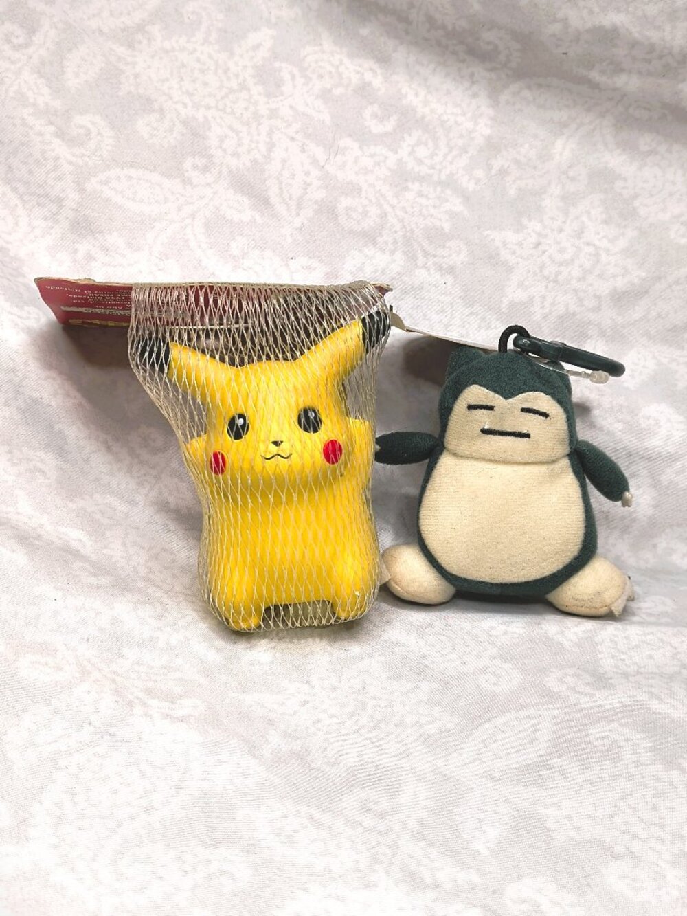 Lot of 2 vintage 1990s Pokémon toys -squeezie Pikachu & plush Snorlax toys wtags